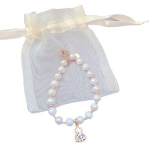 New White Pearl and Gold Charm Bracelet